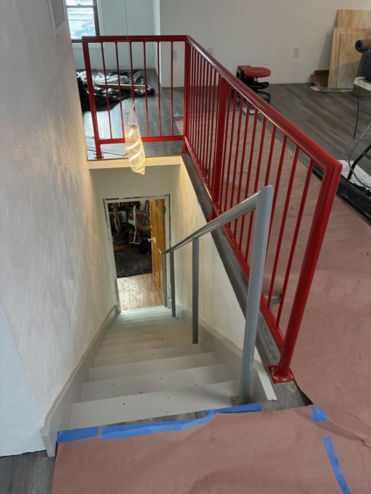 Gray and red powder-coated aluminum railings in Butler