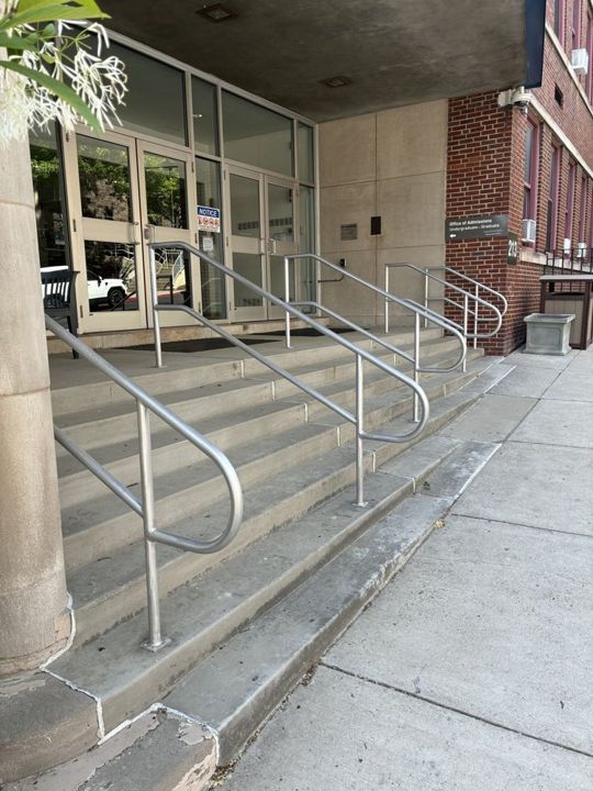 Two-bar pipe aluminum railing with handicap hoops at Carlow University